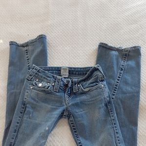 Size 23 True Religion jeans.